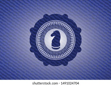 chess knight icon inside emblem with jean high quality background