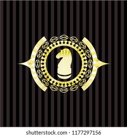 chess knight icon inside gold emblem or badge