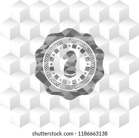 chess knight icon inside grey emblem with cube white background
