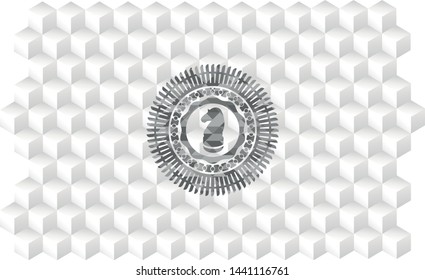 chess knight icon inside grey badge with geometric cube white background