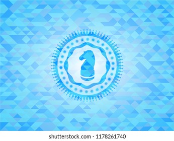 chess knight icon inside light blue emblem with triangle mosaic background