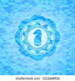 chess knight icon inside light blue emblem. Mosaic background