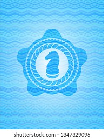 chess knight icon inside light blue water wave emblem.
