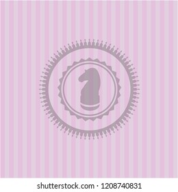 chess knight icon inside pink emblem. Vintage.