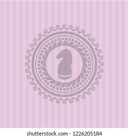 chess knight icon inside pink emblem. Retro