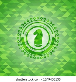 chess knight icon inside realistic green mosaic emblem