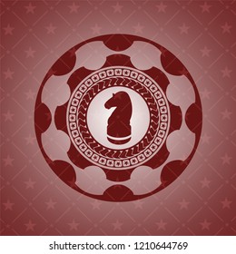 chess knight icon inside red icon or emblem