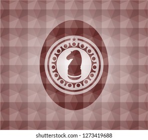 chess knight icon inside red seamless geometric badge.