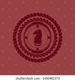 chess knight icon inside red icon or emblem