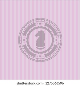 chess knight icon inside retro pink emblem