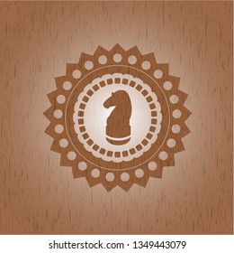 chess knight icon inside retro wood emblem