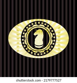 chess knight icon inside shiny emblem. 