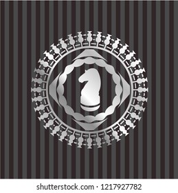 chess knight icon inside silver emblem or badge