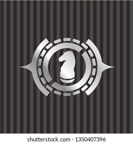 chess knight icon inside silver shiny badge