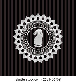 chess knight icon inside silvery emblem. 