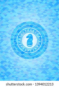 chess knight icon inside sky blue mosaic emblem