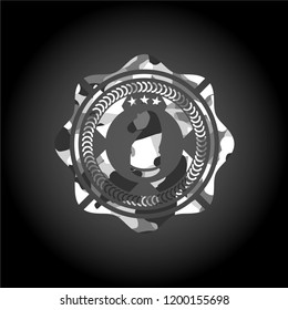 chess knight icon on grey camouflage texture