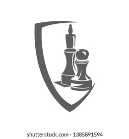 chess pawn and king pieces inside heraldic shield - sport game monochrome vector emblem design