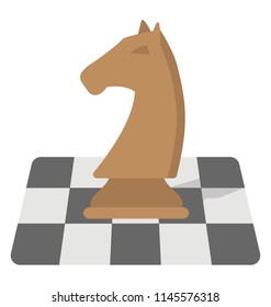 A chess piece placed over checkered chess board 