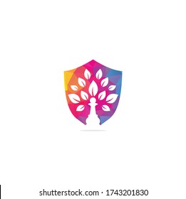 Chess tree shield shape concept logo design. Green tree vector logo design.