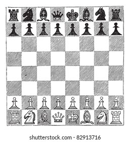 Chess, vintage engraving. Old engraved illustration of Chess showing chess pieces arranged on a chess board. Trousset encyclopedia (1886 - 1891).