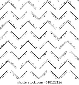 chevron abstract hand draw seamless pattern. Zigzag, wave. Black lines and dots on white background. eps10