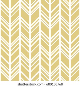 Chevron background in gold and white. Seamless vector pattern
