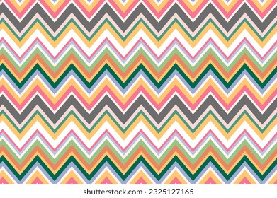 Chevron repeat pattern made of multicolored zigzags. Boho surface design for printing on fabrics.