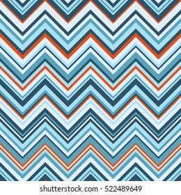 Chevron in shades of blue with a splash of orange.