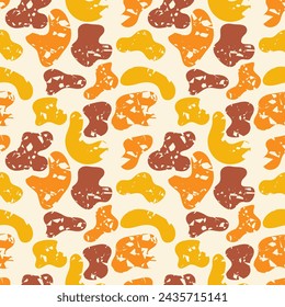 Chic spotted seamless pattern in warm colors. Vector illustration for print, fabric, cover, packaging, interior decor, blog decoration and other your projects.