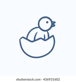 Chick peeking out of egg shell sketch icon for web, mobile and infographics. Hand drawn chick icon. Chick vector icon. Chick icon isolated on white background.