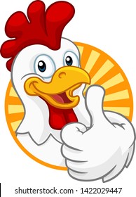 A chicken cartoon rooster cockerel character mascot giving a thumbs up.