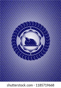 chicken dish icon inside badge with denim texture