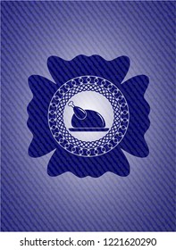 chicken dish icon inside badge with denim texture