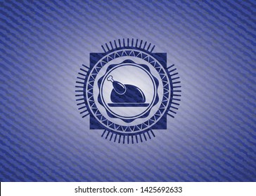 chicken dish icon inside badge with denim texture