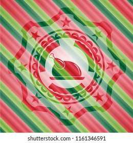chicken dish icon inside christmas badge.