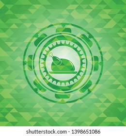 chicken dish icon inside green emblem with mosaic ecological style background