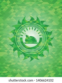 chicken dish icon inside green mosaic emblem