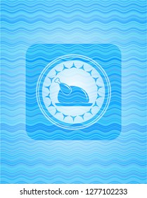 chicken dish icon inside light blue water wave badge background.