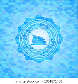 chicken dish icon inside light blue mosaic emblem