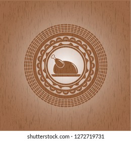 chicken dish icon inside realistic wooden emblem
