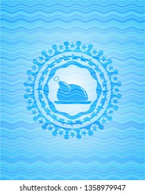 chicken dish icon inside sky blue water wave badge.