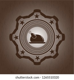 chicken dish icon inside vintage wooden emblem