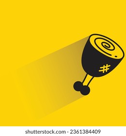 chicken drumstick with shadow on yellow background