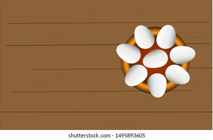 chicken eggs in a plate on the table