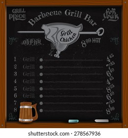 chicken grill on spit. Grill menu on black chalkboard 