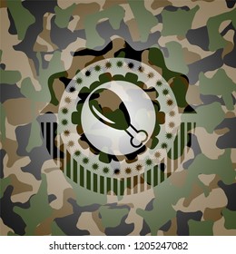 chicken leg icon inside camouflage texture