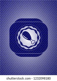 chicken leg icon inside emblem with denim texture