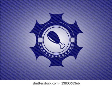 chicken leg icon inside emblem with jean background
