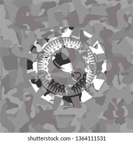 chicken leg icon inside grey camouflaged emblem